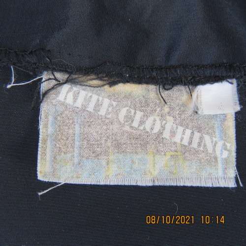 Elegant tailored black silky,shiny top/jacket. V neck,short sleeves and button down.Size 36 from UK.