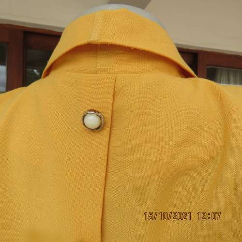 Fabulous mustard colour button down top by MERIEN HALL size 40/16.Sheer long sleeves.Buttons at back