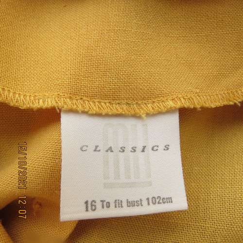 Fabulous mustard colour button down top by MERIEN HALL size 40/16.Sheer long sleeves.Buttons at back