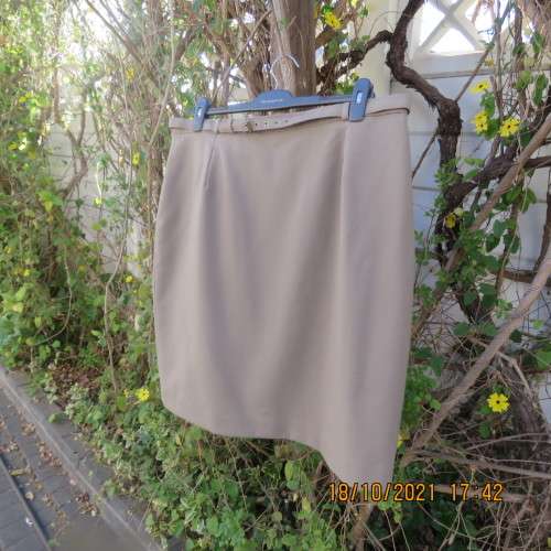 Classy fully lined khaki pencil skirt calf length size 46/22 by CALLIE from Parklane.In Trevita/Wool