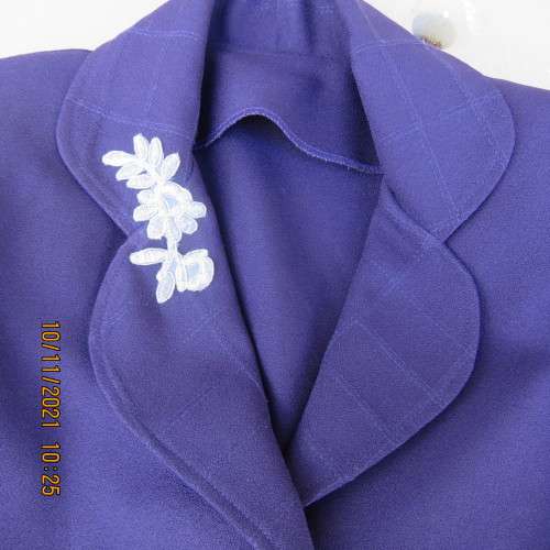 Smart boutique made purple long sleeve jacket.Four button closure with cloverleaf collar.Size 36.