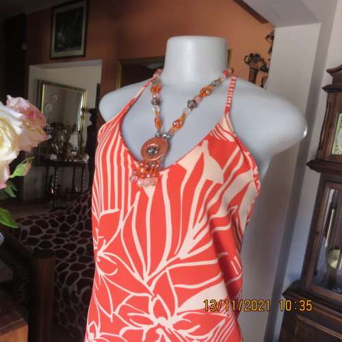 Ultra cool and sexy nectarine-pale peach geometric printed strappy top size 32