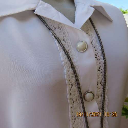 Beautiful short sleeve button down white top with cotton lace both sides.Size 36/12.Shirt collar.