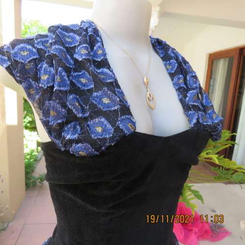 Youthful black velvet dropped waist dress. Acrylic lace,blue,gold skirt and shoulders.Size32 byOTT