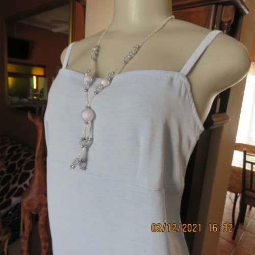 Powder blue empire style strappy top size 34/10 loose fit top in polyester satin.Owner made.As new