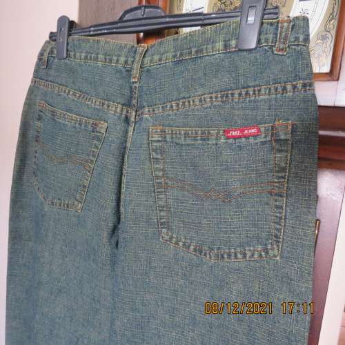 As new men`s straight legged denim jeans size 36 by JML. With lots of pockets.High waist,