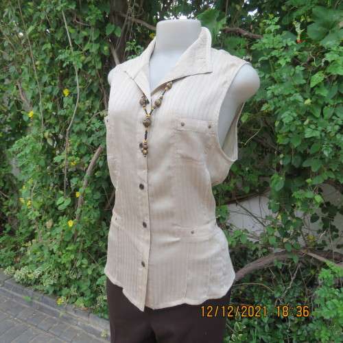 Cool sleeveless wheat colour button down top with open collar.Two small pockets.Size 36/12 . As new.