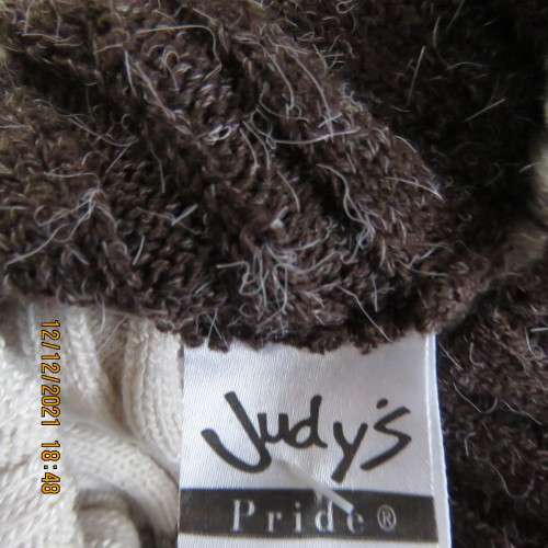 Knitted poloneck top in wide brown and cream horizontal lines. Acrylic yarn.Rib stich. Size 36 to 38