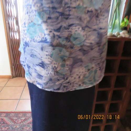 Exquisite 100% rayon CUPID short sleeve top in medley of blues and turquoise.Button down.New cond.