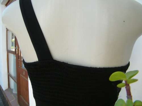 Amazing black bodycon one shoulder size 32/8 dress with black floral/silver decoration.By TRUWORTHS.