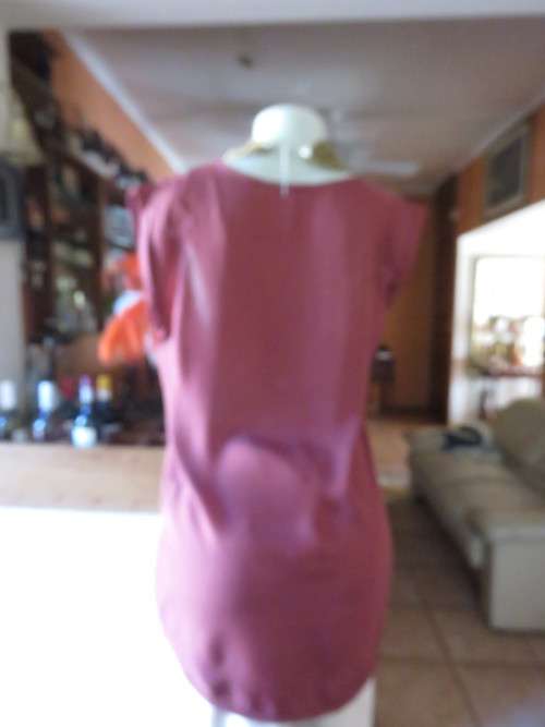 Fabulous maroon COTTON ON size 34/10 top longer at back.Scooped neckline.Luxury poly.As new