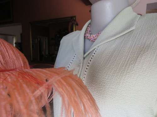 Get bonus fashion points with this mint green button down top/jacket size 36/12 in textured poly.