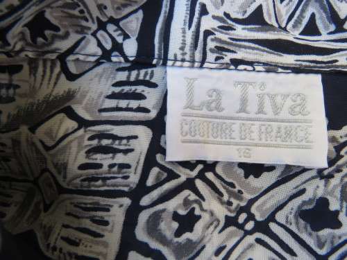 Smart navy with grey/white geometric pattern long sleeve top.By LA TIVA size 40/16.New cond.