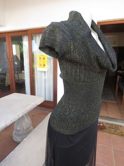 All that glitters!! Black acrylic knitted capped sleeve top with gold thread.Amazing collar.Size 38