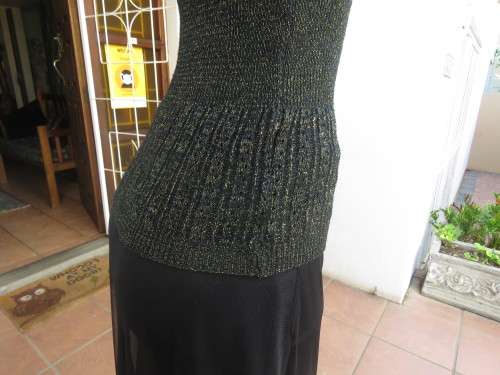 All that glitters!! Black acrylic knitted capped sleeve top with gold thread.Amazing collar.Size 38