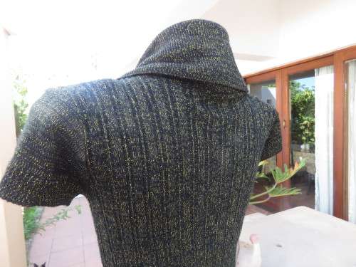 All that glitters!! Black acrylic knitted capped sleeve top with gold thread.Amazing collar.Size 38