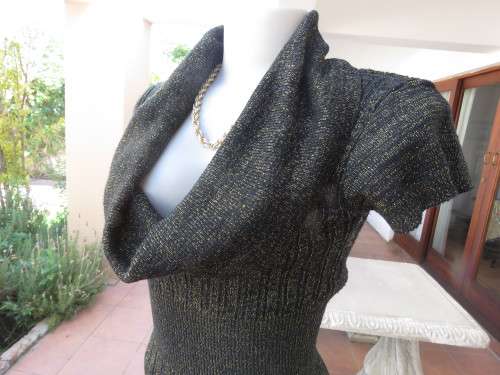 All that glitters!! Black acrylic knitted capped sleeve top with gold thread.Amazing collar.Size 38