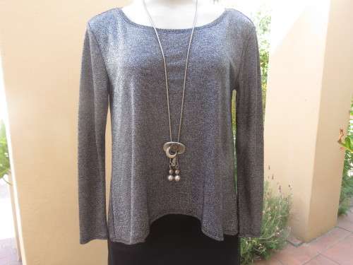Glitter long sleeve slip over top in polyester,viscose,metalic silver.Size 36 to 38 by H+M As new
