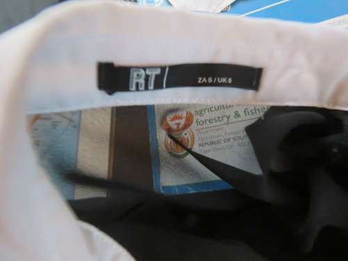 Sweet black/white sheer polyester button down top with white shirt collar.Longer back.Size 32 to 34
