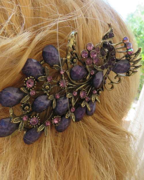 Amazing peacock design hairclip with purple stones and antique gold metal clip. New