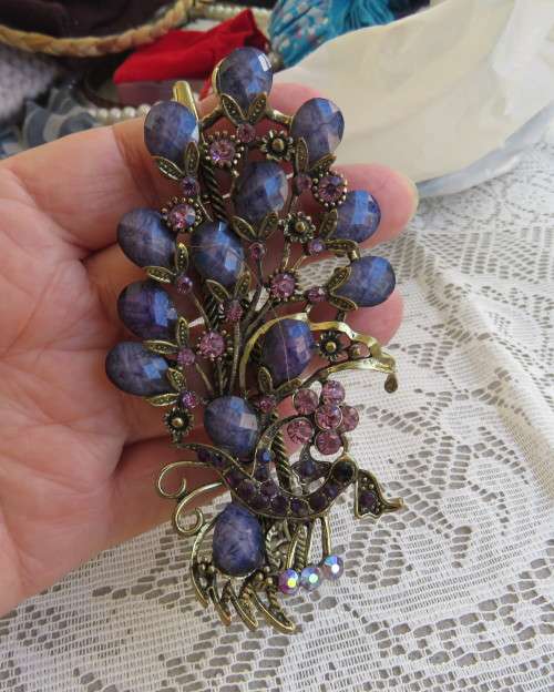 Amazing peacock design hairclip with purple stones and antique gold metal clip. New