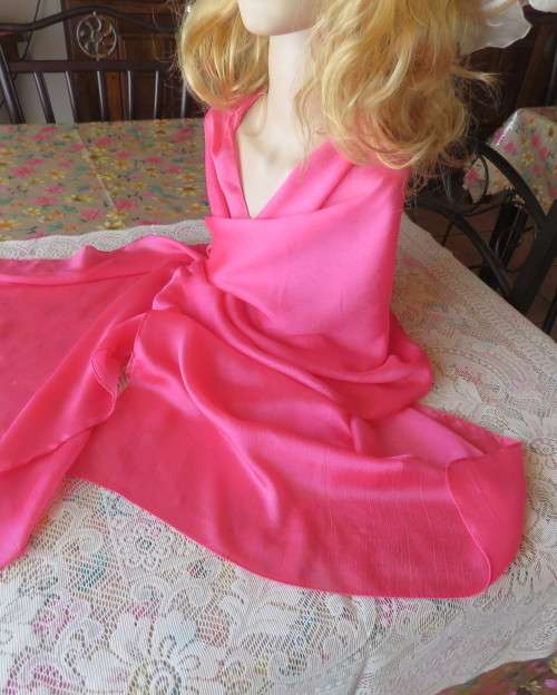 Silky,shiny magenta pink scarf in polyester fabric. Size 175cm x 53cm. Luxury soft feel. New