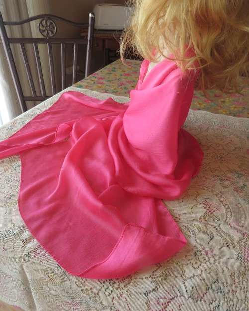 Silky,shiny magenta pink scarf in polyester fabric. Size 175cm x 53cm. Luxury soft feel. New