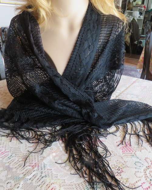 Chic fringed triagle wrap in mesh look with floral pattern and border. 150cm x 125cm x 125cm. As new
