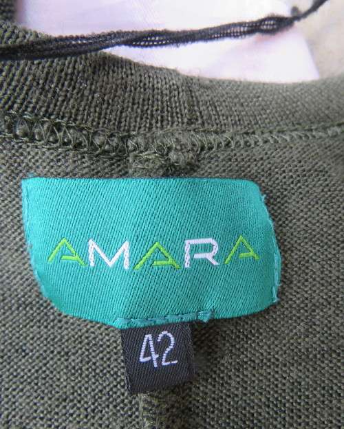 Knitted shrug in dark olive green polyester stretch knit.Size 42/18 by AMARA.Bolero front.As new.