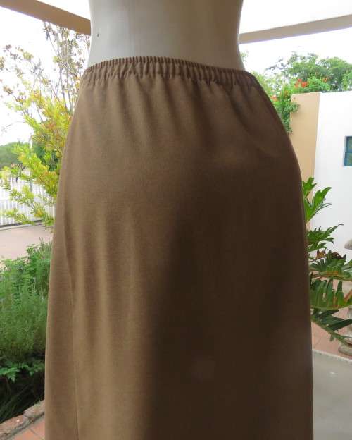 As new vintage ankle length fold over military green skirt by FASHIONETTE size 38.Two button front.