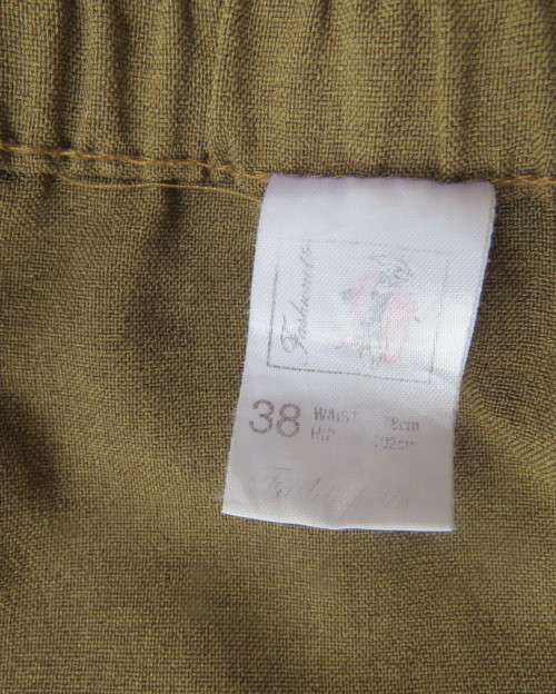 As new vintage ankle length fold over military green skirt by FASHIONETTE size 38.Two button front.