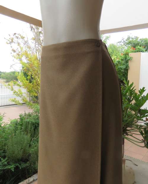 As new vintage ankle length fold over military green skirt by FASHIONETTE size 38.Two button front.
