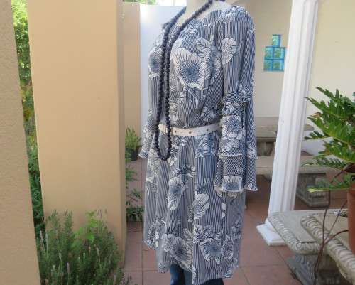 New long vertical striped navy/white floral top.Stunning sleeves with flare cuffs.Size 40.INWEAR