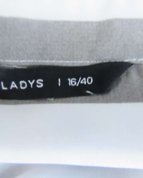 Fabulous extra long top/shirt in grey/white vertical stripes. Yoked. Elbow length sleeves.Size 40/16