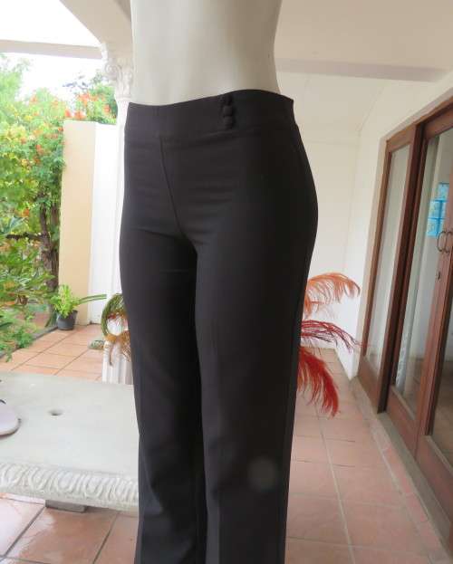 Smart black straight legged dress pants. Bandless with back zip.By SMILEY size 32/8.As new