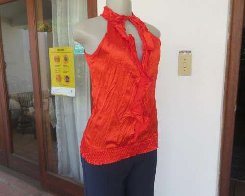 Sweet red silky creased blouson sleeveless top.Wide elasticated seamline.Size 30/6 by IQ.New cond.