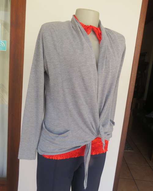 Handy silvergrey light weight long sleeve poly/rayon waterfall style top by WOOLWORTHS size 34 to 36