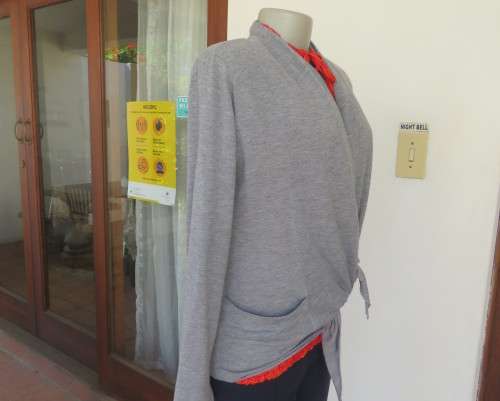 Handy silvergrey light weight long sleeve poly/rayon waterfall style top by WOOLWORTHS size 34 to 36