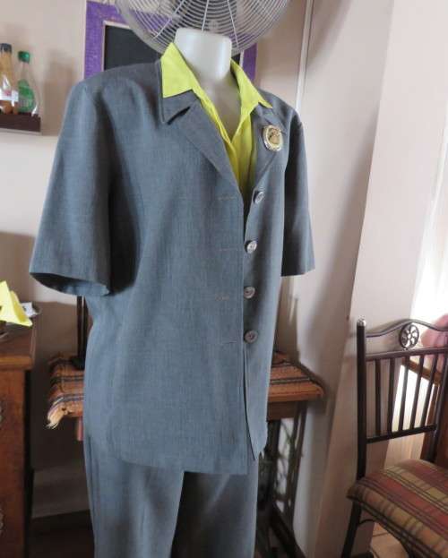 As new mottled grey pant suite size 42/18 by TOPICS Dress pants. Short sleeve 4 button down jacket