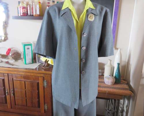 As new mottled grey pant suite size 42/18 by TOPICS Dress pants. Short sleeve 4 button down jacket