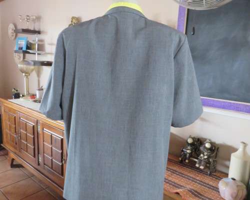 As new mottled grey pant suite size 42/18 by TOPICS Dress pants. Short sleeve 4 button down jacket