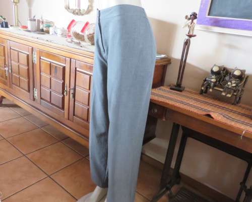 As new mottled grey pant suite size 42/18 by TOPICS Dress pants. Short sleeve 4 button down jacket