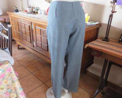 As new mottled grey pant suite size 42/18 by TOPICS Dress pants. Short sleeve 4 button down jacket