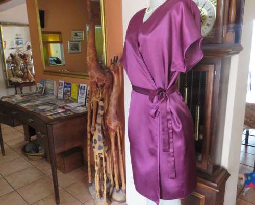 Sexy silky polyester fold over night gown in purple with side pockets.By DREAMER size 34 to 36.