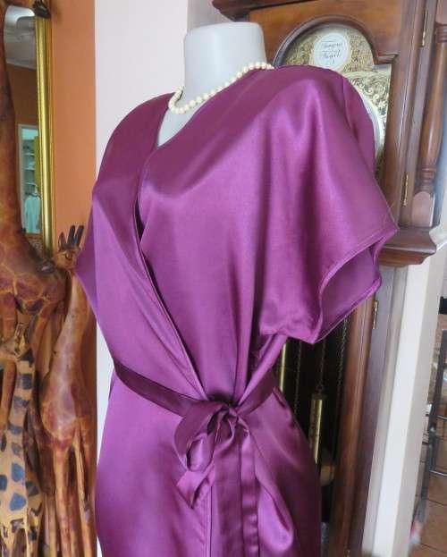 Sexy silky polyester fold over night gown in purple with side pockets.By DREAMER size 34 to 36.