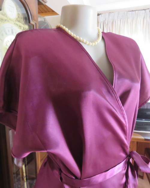 Sexy silky polyester fold over night gown in purple with side pockets.By DREAMER size 34 to 36.