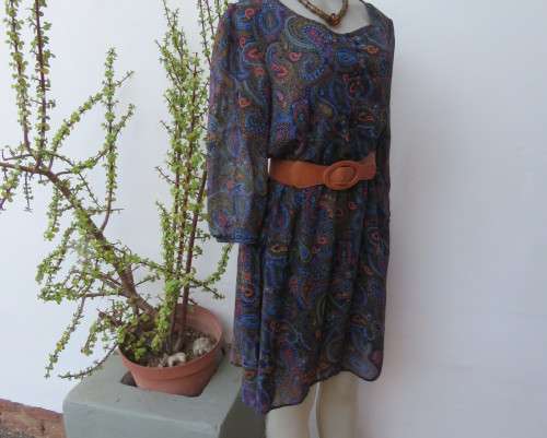 Marvelous sheer polyester lined slip over dress in blues,peach and gold paisley pattern.Size 38/14