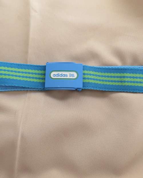 Genuine ADIDAS belt in polyester length 115cm. Size adjustable. In blue and yellow stripes. New cond