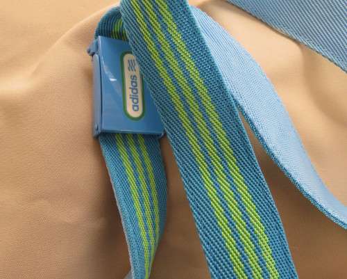 Genuine ADIDAS belt in polyester length 115cm. Size adjustable. In blue and yellow stripes. New cond