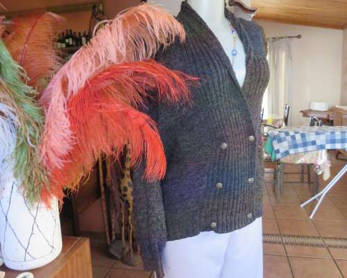 Warm acrylic knit dark jewel colour long sleeve cardigan.Double breast. Size 42 to 44.Very good cond